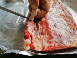 trimming flank steak
